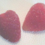 two strawberries cut