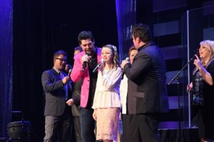 Katie singing with Jason Crabb and Mike Bowling